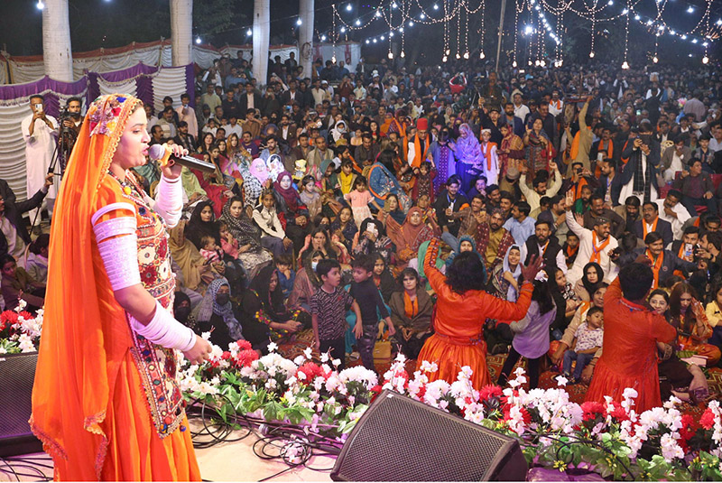 Female Folk Singer Marwal singing a cultural song during Sindh Sufi Festival at Sindh Museum