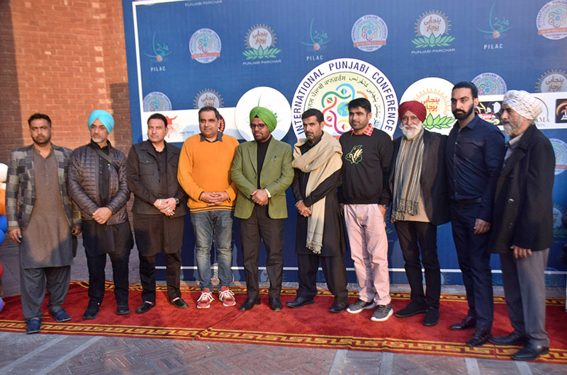 Sikh Yatri artists showcasing their talents during the International Punjabi Conference