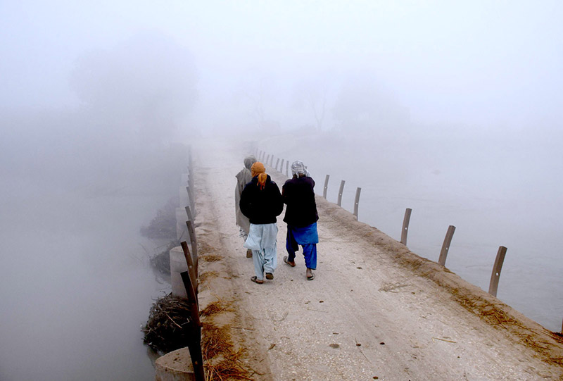 A view of thick fog that engulfs the whole city during morning time