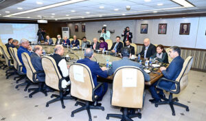 Caretaker Prime Minister Anwaar-ul-Haq Kakar chairs a meeting of prominent members of the Pakistan Stock Exchange, renowned businessmen and investors