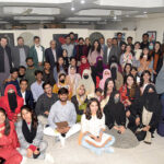 A group photo of participants of exhibition with Director General Food Authority, Asim Javed, famous cartoonist Javed Iqbal at Kopra Art Gallery