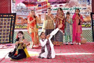 Students performing in a tableau during a Sindh culture function at Govt Saint Joseph High School