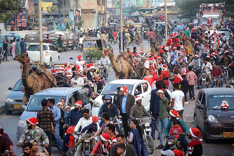 The female participants of a ‘Christmas Aman Rally’ waving their hands