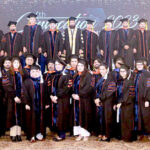 Caretaker Federal Minister for Information & Broadcasting, Murtaza Solangi and Punjab Governor Balighur Rahman in a group photo with graduates at the 4th Convocation of Information Technology University, Main Campus.