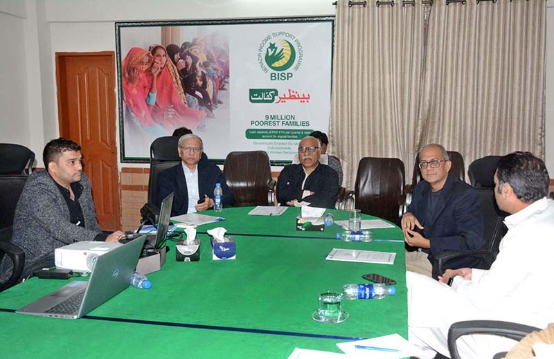 Chairperson Benazir Income Support Programme Muhammad Amjad Saqib in a meeting with BISP DG Sindh and officers during his visit to BISP DG office