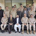 Caretaker Federal Minister for Interior and Narcotics Control Sarfraz Ahmed Bugti in a group photo during the inauguration of Anti-Narcotics Force Forensic Lab.