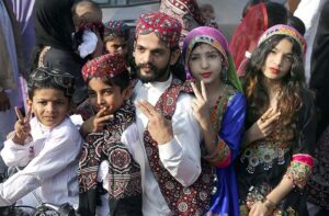 Children enjoying and celebration during celebration of Sindhi Ajrak Topi Culture Day at Sindh Museum