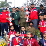 Group photo of Former Captain and International Weightlifter Aqeel Javed Butt with the National Team at the Punjab Police Inter-Range Athletics Championship