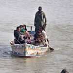 A family enjoying the boat ridding at Indus river
