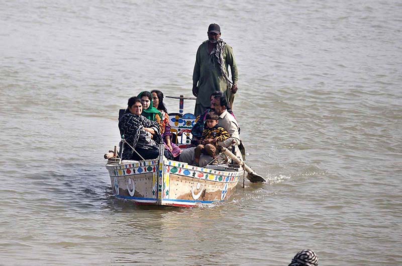 A family enjoying the boat ridding at Indus river