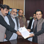 Candidates submitting nomination paper to the Returning Officer for PB-39