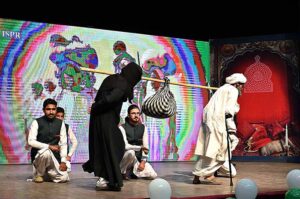 Students performing on stage during seminar on International Day of Persons with Disabilities at Punjab Council of Arts.