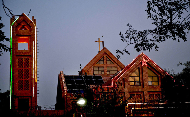 An eye-catching view of a Church at G-7 decorated with colorful lights during Christmas celebrations