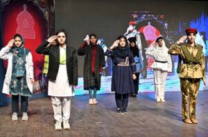 Students performing on stage during seminar on International Day of Persons with Disabilities at Punjab Council of Arts.