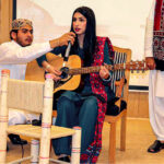 A student singing cultural song during Sindhi Culture and Heritage Day by Haseeb Ahmad Chairman Sindhi Sangat at SZABIST