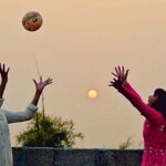 Youngsters playing during the last sunset of the year 2023