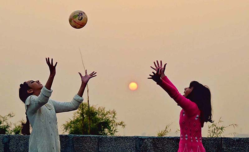 Youngsters playing during the last sunset of the year 2023
