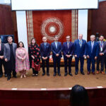 Caretaker Prime Minister Anwaar-ul-Haq Kakar in a group photo with the faculty of Aga Khan University and esteemed guests of Health Tech Summit