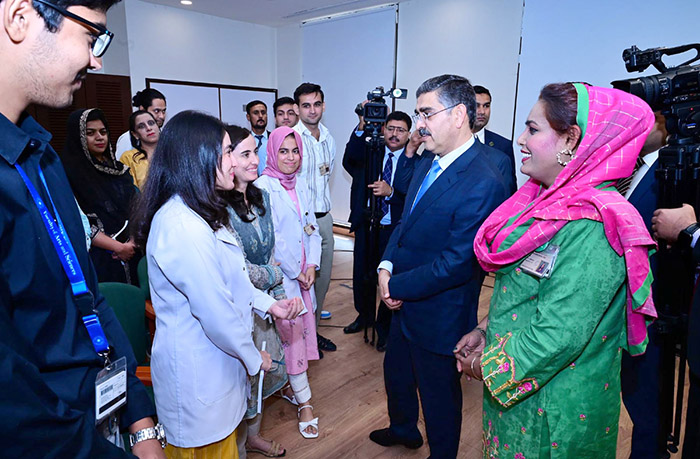 Caretaker Prime Minister Anwaar-ul-Haq Kakar interacting with students and faculty of Aga Khan University
