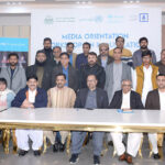 A group photo of Director EPI Punjab Dr. Mukhtar Ahmad with participants of the Media Orientation Workshop organized by EPI Punjab and UNICEF to strengthen routine immunization at Local Hotel.