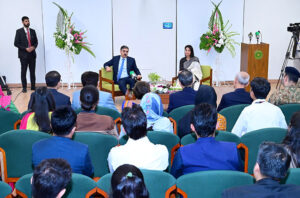 Caretaker Prime Minister Anwaar-ul-Haq Kakar interacting with students and faculty of Aga Khan University.