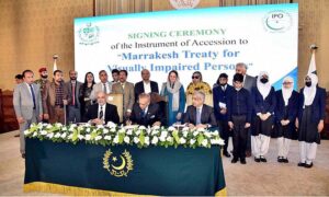 President Dr Arif Alvi signing the Instrument of Accession to the Marrakesh Treaty for the Visually Impaired Persons in a ceremony, at Aiwan-e-Sadr