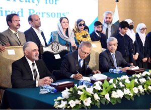 President Dr Arif Alvi signing the Instrument of Accession to the Marrakesh Treaty for the Visually Impaired Persons in a ceremony, at Aiwan-e-Sadr