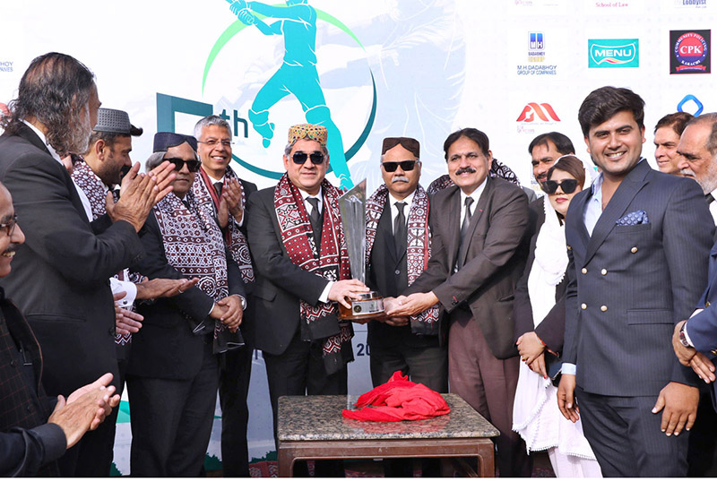 Chief Justice Sindh High Court Mr.Justice Aqeel Ahmed Abbasi along with President Justice Helpline International Nadeem A.Shaikh and others unveiling the trophy during Grand opening ceremony of 5th Law Students Cricket League 2023 at Karachi Gymkhana Ground
