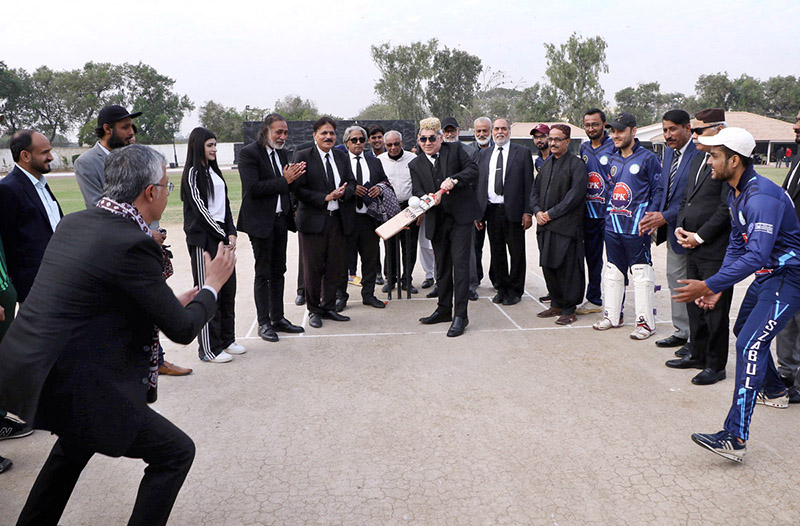 Chief Justice Sindh High Court Mr.Justice Aqeel Ahmed Abbasi along with President Justice Helpline International Nadeem A.Shaikh and others unveiling the trophy during Grand opening ceremony of 5th Law Students Cricket League 2023 at Karachi Gymkhana Ground