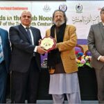 Caretaker Federal Minister for Education and Professional Training, Madad Ali Sindhi giving shield to participant during 3rd International Conference on "Modern Trends in the Arab Novel in the Second Half of the Twentieth Century” organize by AIOU at Academic Auditorium