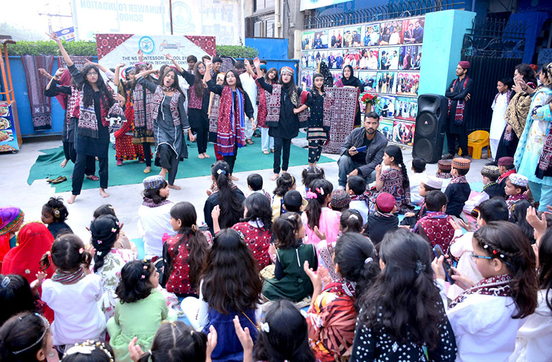 Girls students performing the tableau on stage during the program in connection with Sindhi Culture Day at the NS Montessori School