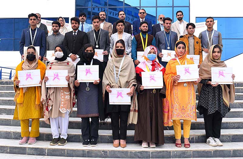 Deputy Chairman Senate of Pakistan Mirza Muhammad Afridi, Managing Director PMDC Muhammad Sabur Sethi and Director Colleges Muhammad Sohail in a group photo with position holder students during Academic Excellence Award Ceremony of Peshawar Model Degree Colleges