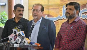 Caretaker Sindh Information, Minorities Affairs Minister Ahmed Shah talking to media persons during KPC visit