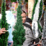 A Christian family is busy in shopping in connection with Christmas