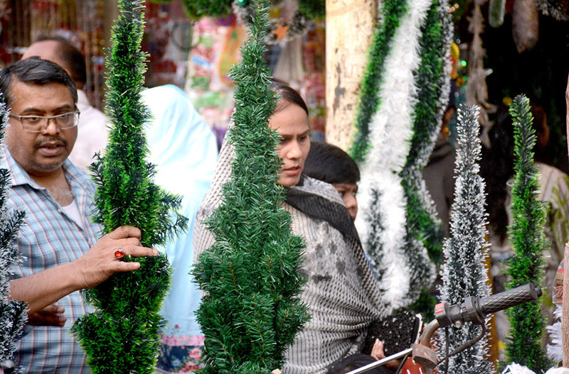 A Christian family is busy in shopping in connection with Christmas