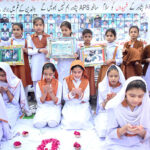 Students offering dua in commemoration of Martyrs of Army Public School Peshawar at Royal Cambridge School