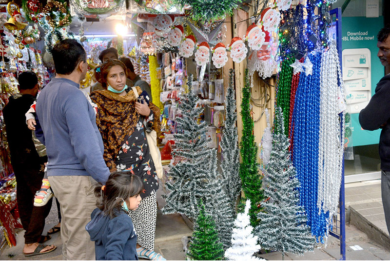A Christian family is busy in shopping in connection with Christmas