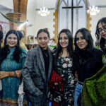 Group photo of Christian community members on Christmas Day at St. Thomas Church.