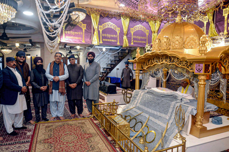 Caretaker Federal Minister for Religious Affairs and Interfaith Harmony Aneeq Ahmed visiting Gurdwara Guru Nanak Darbar Swami Narain Mandir Light House