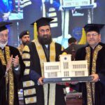 VC University of Sargodha Pro. Dr Qaisar Abbas presenting souvenir to Chancellor University of Sargodha, Governor Punjab Mohammad Baligh-Ur-Rehman during 10th Convocation of the University