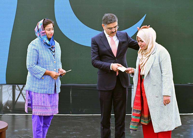 Caretaker Prime Minister Anwaar-ul-Haq Kakar distributes cheques among the high achievers of NUST hailing from Balochistan Caretaker Prime Minister Anwaar-ul-Haq Kakar distributes cheques among the high achievers of NUST hailing from Balochistan