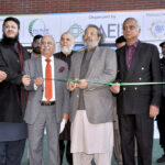 Federal Minister for Education Professional Training Madad Ali Sindhi cutting ribbon during the opening ceremony of 3rd Pakistan International Property housing & Construction Expo-23 at Pak China Friendship Center