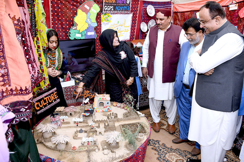 Commissioner Larkana Division Abdul Waheed Sheikh along with Director Schools Education Primary Gulshir Soomro and District Education Officer Primary Anees Rehman Jalbani visiting different cultural stalls after Inauguration the first annual Science, Arts and Cultural Exhibition 2023, organized by District Education Office at Government Boys Primary School Sachal Colony