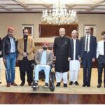 President Dr. Arif Alvi in a group photo with a delegation of Center for Peace and Development Initiatives comprising of social activists and persons with disabilities at Aiwan-e-Sadr