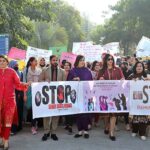 Provincial woman ombudsman Nabila Hakim Ali Khan leading a walk after seminar for the protection of women's rights at Government College Women's University Madina Town