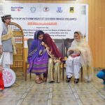 Students performing drama on stage during the closing ceremony of the 16 Days of Activism Against Gender-Based Violence, organized by the Khyber Pakhtunkhwa Commission on the Status of Women KPCSW.