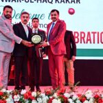 Caretaker Prime Minister Anwaar-ul-Haq Kakar receives a souvenir shield by the Caretaker Federal Minister of Human Rights Mr. Khalil George