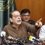 Caretaker Sindh Information Minister Ahmed Shah addressing a press conference at Sindh Assembly building