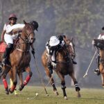 Players struggling to get hold on the ball during Polo match between Master Paints and FG Din Polo during Hamadan 12th Lahore Open Polo Championship 2023 at Lahore Polo Club