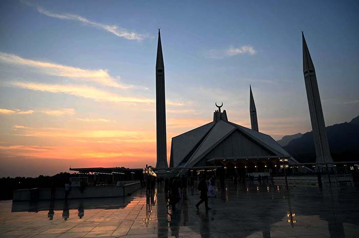 A view of Faisal Masjid in the background a beautiful view of sunset in the Federal Capital.